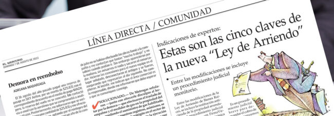 Un periódico presenta un artículo sobre la nueva Ley de Arriendo. Un dibujo muestra una figura entregando un documento. Se encuentra sobre una superficie, posiblemente sostenido por una persona.